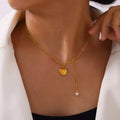 Imitation Pearl Heart Pendant Necklace in Gold Titanium